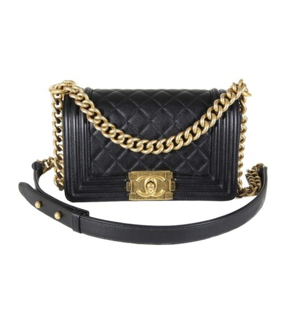 CHANEL 'Boy' Diamond Quilted Leather Flap Bag. Original Quality Bag including gift box, care book, dust bag, authenticity card. Created by Karl Lagerfeld, the iconic design owes its name to Gabrielle Chanel's first love, Boy Capel. This Chanel Boy Flap Bag Quilted is every woman's dream. Crafted from calfskin leather, the bag features Chanel's signature diamond quilting, chunky chain link strap with leather shoulder pad, and metal-tone hardware accents. Its CC Boy logo closure opens to a fabric-lined interior with slip pocket perfect for daily essentials. A sought-after, luxurious accessory. | CRIS&COCO Authentic Quality bags and Accessories