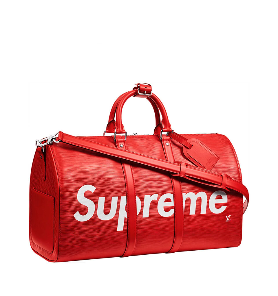 LOUIS VUITTON X SUPREME. Original Quality Bag including gift box, care book, dust bag, authenticity card. Epi leather, introduced 1985, became the first permanent leather collection of Louis Vuitton, and is tanned with plant extracts before dying. The process allows for colors as vibrant as this shade of red to stand out. Introduced in 1930, the Louis Vuitton Keepall was one of the first bags ever made by Louis Vuitton that is still in production today. Supreme debuted in 1994,140 years after Louis Vuitton was founded in Paris. Louis Vuitton’s collaboration with Supreme, dubbed the “coolest streetwear brand in the world right now” by GQ, was first shown at Paris Men’s Fashion Week in January 2017. Both stylish and practical, the Louis Vuitton x Supreme Keepall Bandouliere 45 is the perfect personification of classic LV and the highly sought after Supreme brand of cool. | CRIS&COCO Authentic Quality bags and Accessories