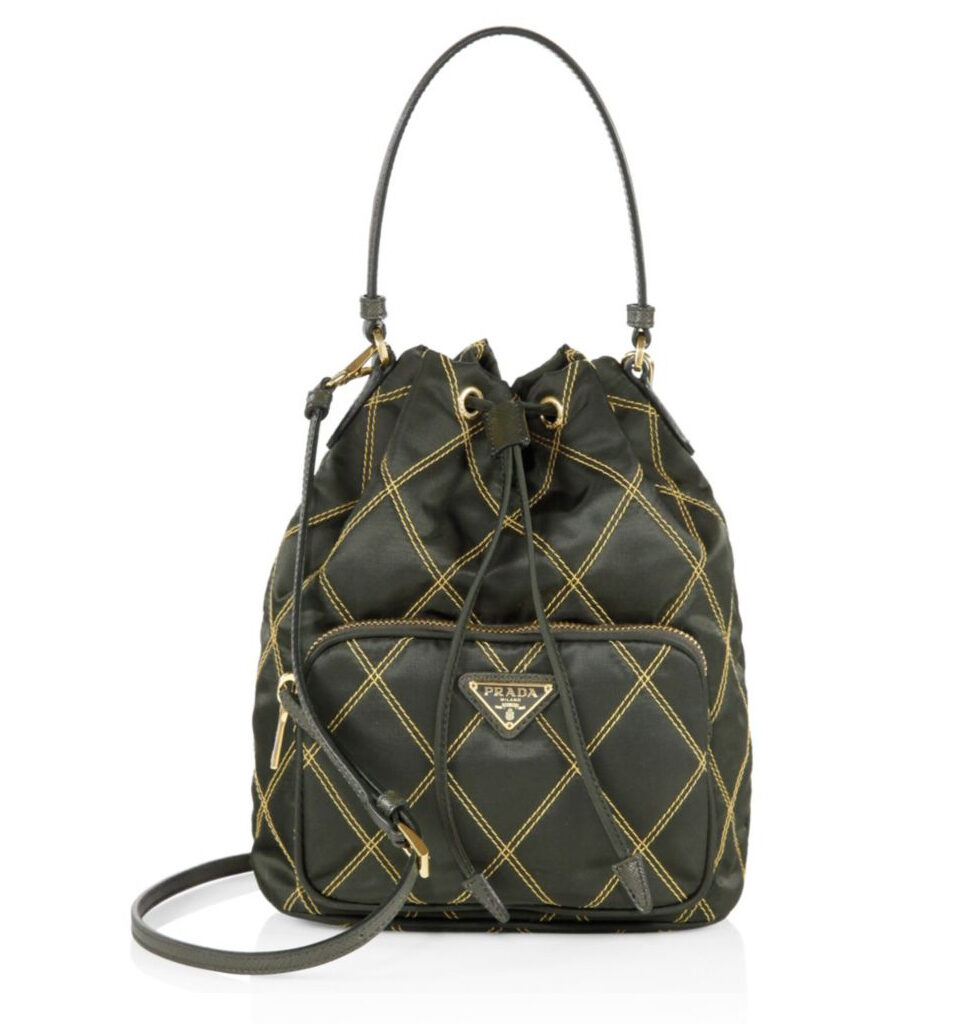 PRADA Quilted Bucket Bag. Original Quality Bag including gift box, care book, dust bag, authenticity card. PRADA nylon bucket bag with tessuto-impunturato quilted topstitching. Leather top handle. Drawstring top. Detachable Shoulder Strap. Front Zip Pocket with logo plate. | CRIS&COCO Authentic Quality bags and Accessories