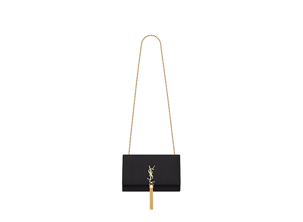 SAINT LAURENT Small 'Kate' Bag with Tassel. Original Quality Bag including gift box, care book, dust bag, authenticity card. Monogram Saint Laurent bag adorned with a curb chain, interlocking YSL initials in metal, and a metallic tassel. Crafted from leather, this Kate shoulder bag from Saint Laurent is decorated with a signature YSL monogram plaque and a hanging tassel detail to the front for an extra refined touch. The perfect go-to for a night out. Featuring a chain shoulder strap, a foldover top with magnetic closure, a main internal compartment, an internal slip pocket, an internal logo patch, an internal logo stamp, and metal hardware. | CRIS&COCO Authentic Quality Designer Bags and Luxury Accessories