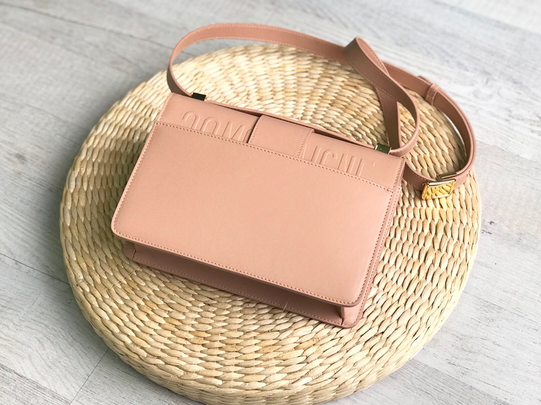 DIOR 30 Montaigne Shoulder Bag. Original Quality Bag. Authentic calfskin. Metal Toned Hardware. DIOR Sales Box and Dust Bag. Booklet, Authenticity Card. Dior released its latest buzzy bag, the 30 Montaigne—named for the house’s flagship address in Paris. Designed by Maria Grazia Chiuri and first spotted on the Dior pre-fall 19 collection, the box bag is inspired by silhouettes from the 1960s and adorned with a shoulder strap and the brand’s signature DIOR logo clasp on the front. | CRIS&COCO | High quality designer bags and luxury accessories