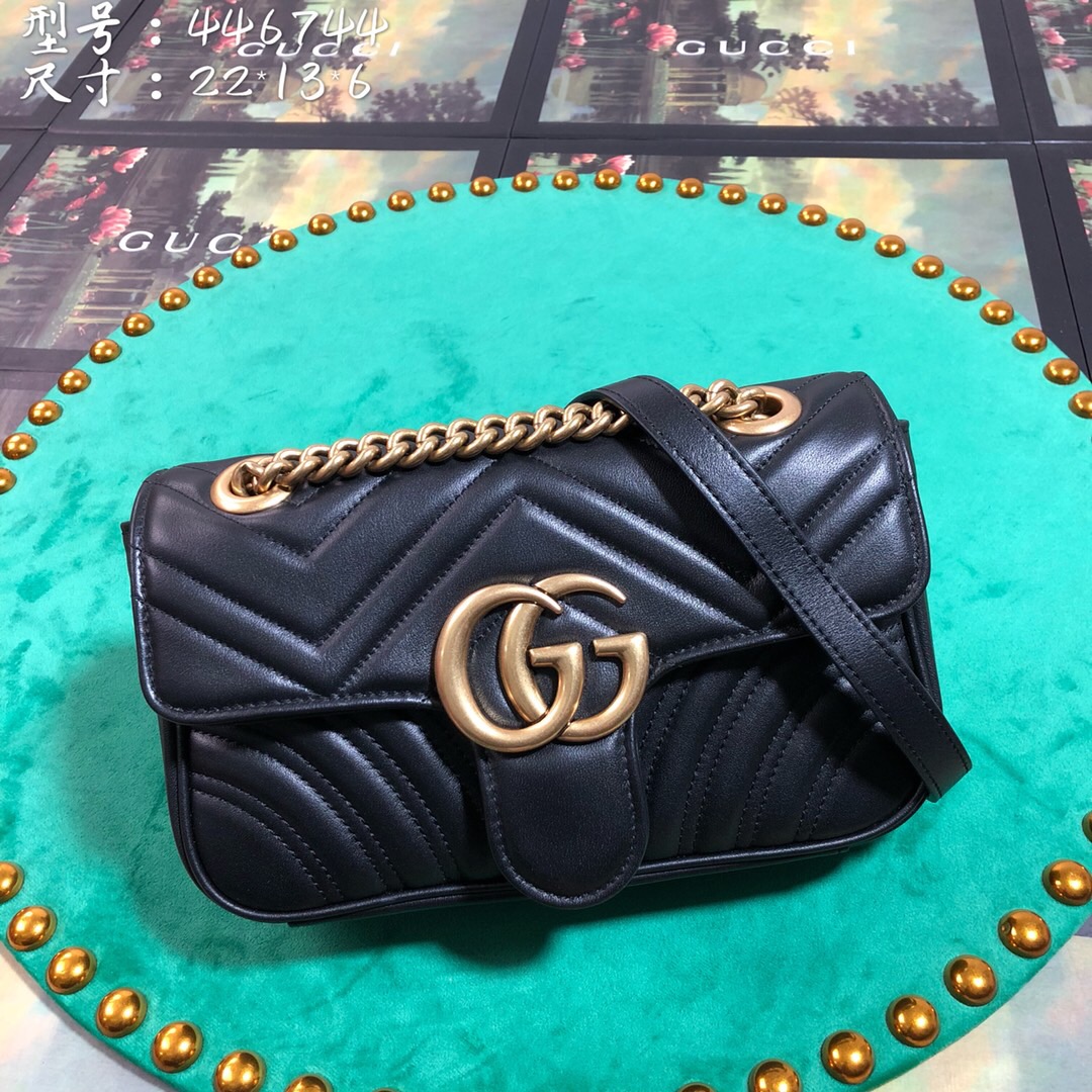 GUCCI GG Marmont Matelassé Mini Bag. High-end quality bag including gift box, literature, dust bag, authenticity card. The small GG Marmont chain shoulder bag has a softly structured shape and an oversized flap closure with Double G hardware. The sliding chain strap can be worn in multiple ways, changing between a shoulder and a top handle bag. Made in matelassé chevron leather with a heart on the back.| CRIS&COCO Authentic Quality Designer Bags and Luxury Accessories