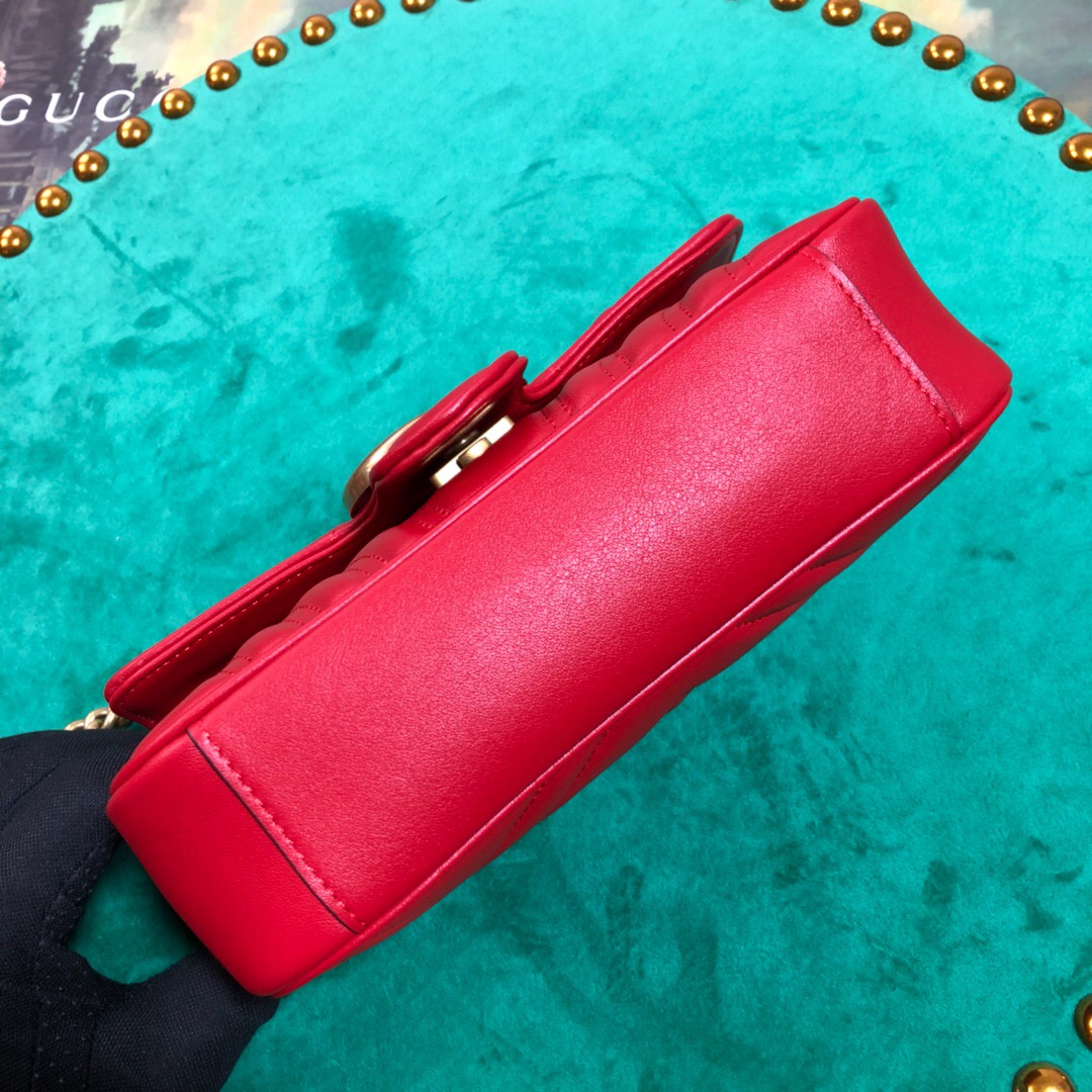 GUCCI GG Marmont Matelassé Mini Bag. High-end quality bag including gift box, literature, dust bag, authenticity card. The small GG Marmont chain shoulder bag has a softly structured shape and an oversized flap closure with Double G hardware. The sliding chain strap can be worn in multiple ways, changing between a shoulder and a top handle bag. Made in matelassé chevron leather with a heart on the back.| CRIS&COCO Authentic Quality Designer Bags and Luxury Accessories