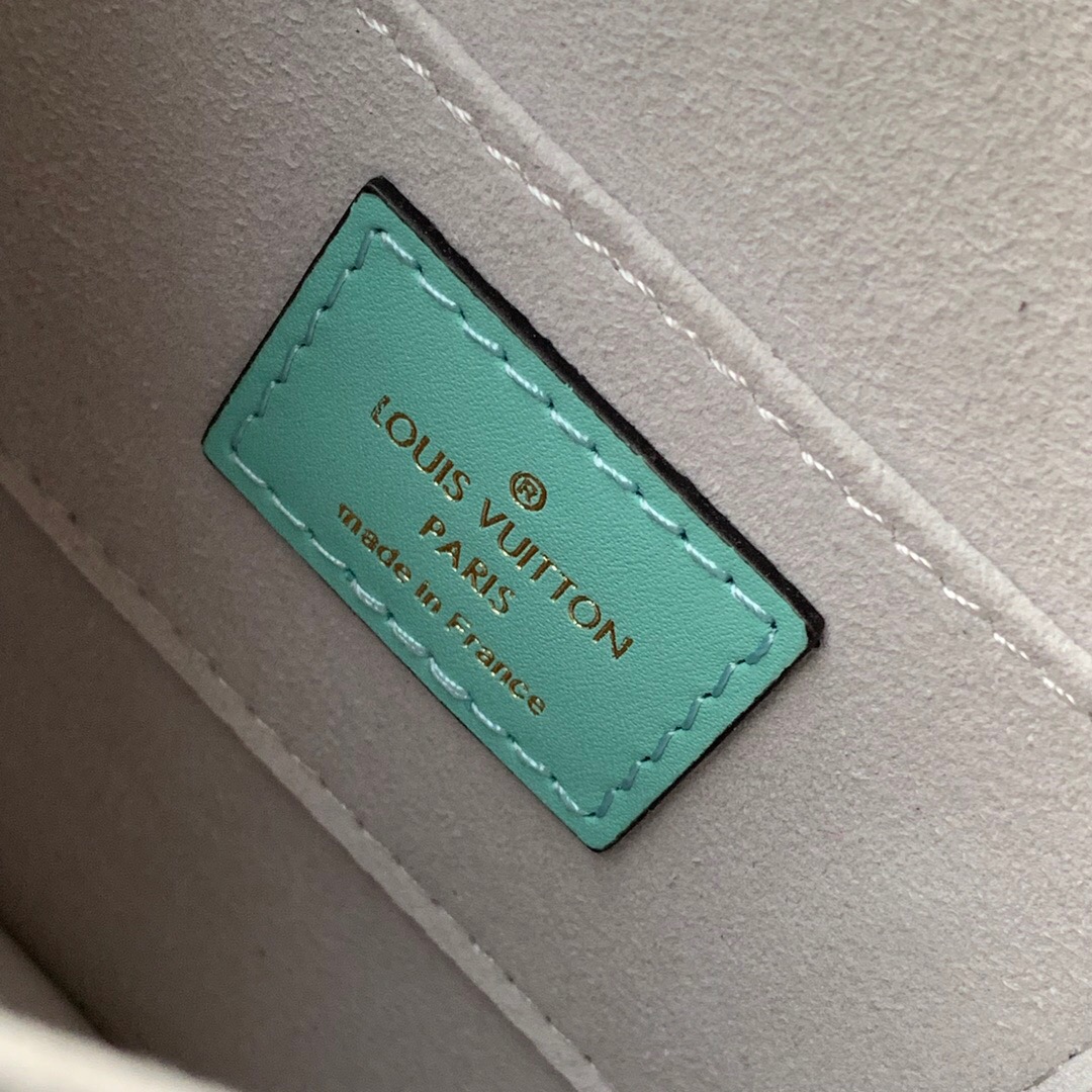 LOUIS VUITTON Mini Dauphine Crossbody and Shoulder Bag. Original Quality Bag including gift box, literature, dust bag, authenticity card. LOUIS VUITTON is expanding its Dauphine family with the Lugano Mini. In smooth calfskin leather, it features striking new signature touches like a gold LV circle lock trimmed with silver guilloche. Refined, elegant styling and convenient carry options make this bag a must-have for Dauphine lovers. | Cris and Coco Authentic Quality Luxury Bags and Accessories