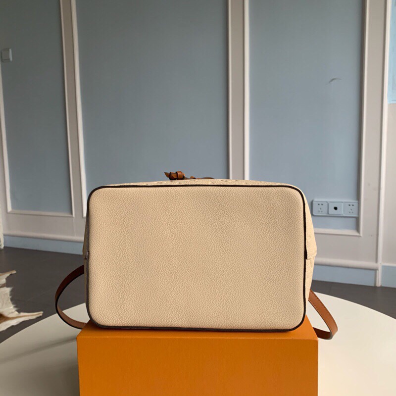 LOUIS VUITTON NéoNoé Monogram Empreinte. Original Quality Bag including gift box, literature, dust bag, authenticity card. A new iteration of the brand’s most popular bag from yesteryears, the NéoNoé in its novel avatar is introduced in stunning Monogram Empreinte. Crafted from supple embossed leather, the bag is available in Noir, Rouge, Crème, and Marine, in a standard ‘MM’ size. The trendy piece features a body-friendly design that is both light-weight as well as comfortable to carry. It comes with a detachable and adjustable strap and a removable top handle and can be doubled as an over-the-shoulder/ cross-body version or a tote variant.| CRIS&COCO Authentic Quality Designer Bags and Luxury Accessories