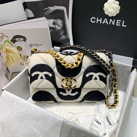 CHANEL '19' Flap Bag. High-end quality bag including gift box, literature, dust bag, authenticity card. Chanel's newest bag was designed along with Virginie Viard, and it made its debut on the runway of Paris Fashion Week earlier this year. The bag, called the Chanel 19 Bag, is aptly named after its birth year, and it is said to be inspired by the classic 2.55 bag. | CRIS&COCO Authentic Quality Designer Bags and Luxury Accessories
