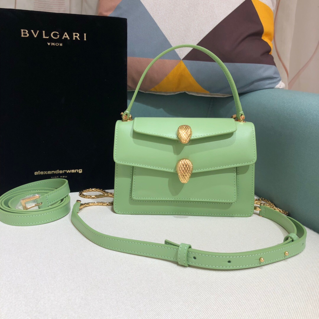ALEXANDER WANG x BVULGARI Belt Bag - CRIS&COCO ALEXANDER WANG x BVLGARI Belt Bag. Original Quality Bag including gift box, care book, dust bag, authenticity card. The belt bag is a dream to style, as it features two detachable straps and a detachable handle and can be worn on the waist, as a crossbody bag, as a clutch or over the shoulder. BVLGARI and ALEXANDER WANG have reprised Serpenti Through The Eyes of ALEXANDER WANG for 2020, with the exciting addition of two brand new bags. While the two in-demand fashion houses may not reveal themselves to be the most obvious collaborators at a superficial glance, they have nonetheless merged to produce their latest capsule collection infusing allure with innovation. | Cris and Coco Authentic Quality designer bags and luxury accessories.