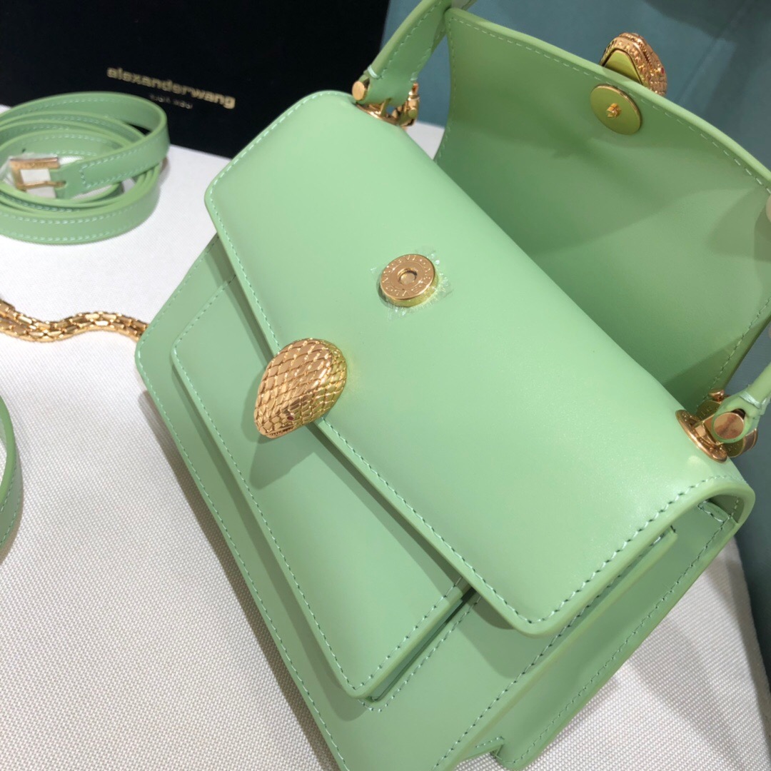 ALEXANDER WANG x BVULGARI Belt Bag - CRIS&COCO ALEXANDER WANG x BVLGARI Belt Bag. Original Quality Bag including gift box, care book, dust bag, authenticity card. The belt bag is a dream to style, as it features two detachable straps and a detachable handle and can be worn on the waist, as a crossbody bag, as a clutch or over the shoulder. BVLGARI and ALEXANDER WANG have reprised Serpenti Through The Eyes of ALEXANDER WANG for 2020, with the exciting addition of two brand new bags. While the two in-demand fashion houses may not reveal themselves to be the most obvious collaborators at a superficial glance, they have nonetheless merged to produce their latest capsule collection infusing allure with innovation. | Cris and Coco Authentic Quality designer bags and luxury accessories.