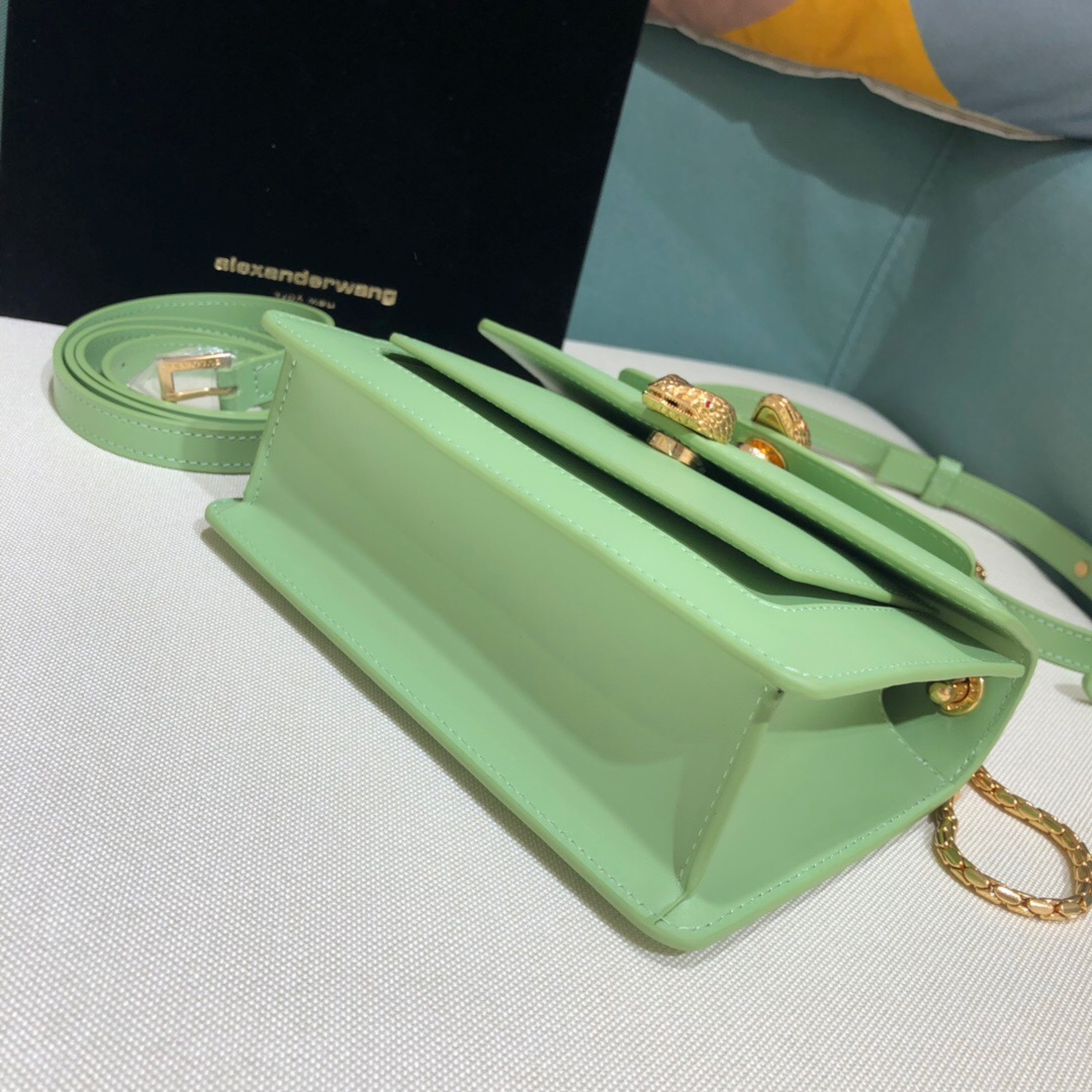 ALEXANDER WANG x BVULGARI Belt Bag - CRIS&COCO ALEXANDER WANG x BVLGARI Belt Bag. Original Quality Bag including gift box, care book, dust bag, authenticity card. The belt bag is a dream to style, as it features two detachable straps and a detachable handle and can be worn on the waist, as a crossbody bag, as a clutch or over the shoulder. BVLGARI and ALEXANDER WANG have reprised Serpenti Through The Eyes of ALEXANDER WANG for 2020, with the exciting addition of two brand new bags. While the two in-demand fashion houses may not reveal themselves to be the most obvious collaborators at a superficial glance, they have nonetheless merged to produce their latest capsule collection infusing allure with innovation. | Cris and Coco Authentic Quality designer bags and luxury accessories.