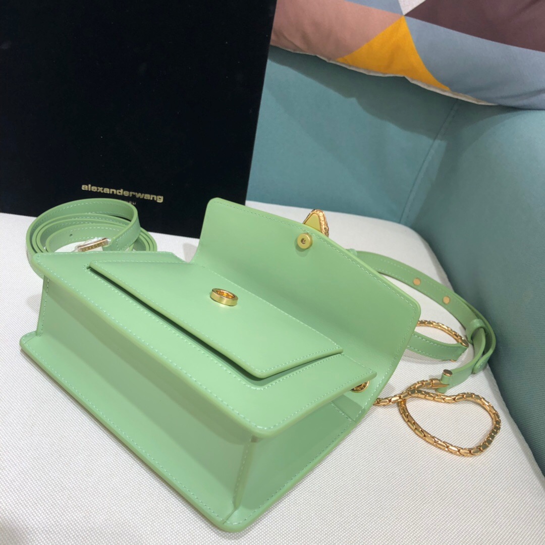 ALEXANDER WANG x BVULGARI Belt Bag - CRIS&COCO ALEXANDER WANG x BVLGARI Belt Bag. Original Quality Bag including gift box, care book, dust bag, authenticity card. The belt bag is a dream to style, as it features two detachable straps and a detachable handle and can be worn on the waist, as a crossbody bag, as a clutch or over the shoulder. BVLGARI and ALEXANDER WANG have reprised Serpenti Through The Eyes of ALEXANDER WANG for 2020, with the exciting addition of two brand new bags. While the two in-demand fashion houses may not reveal themselves to be the most obvious collaborators at a superficial glance, they have nonetheless merged to produce their latest capsule collection infusing allure with innovation. | Cris and Coco Authentic Quality designer bags and luxury accessories.