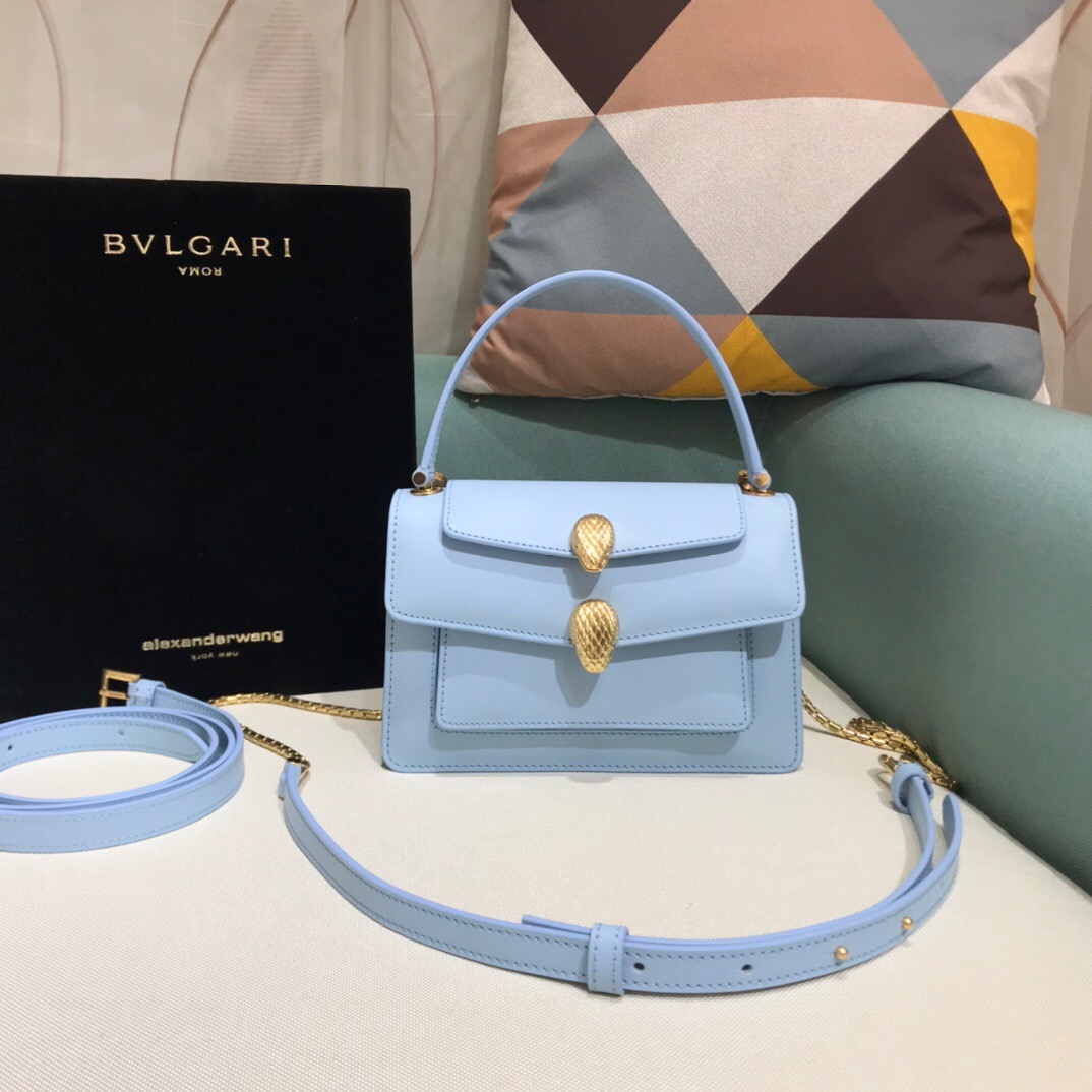 ALEXANDER WANG x BVULGARI Belt Bag - CRIS&COCO ALEXANDER WANG x BVLGARI Belt Bag. Original Quality Bag including gift box, care book, dust bag, authenticity card. The belt bag is a dream to style, as it features two detachable straps and a detachable handle and can be worn on the waist, as a crossbody bag, as a clutch or over the shoulder. BVLGARI and ALEXANDER WANG have reprised Serpenti Through The Eyes of ALEXANDER WANG for 2020, with the exciting addition of two brand new bags. While the two in-demand fashion houses may not reveal themselves to be the most obvious collaborators at a superficial glance, they have nonetheless merged to produce their latest capsule collection infusing allure with innovation. | Cris and Coco Authentic Quality designer bags and luxury accessories.