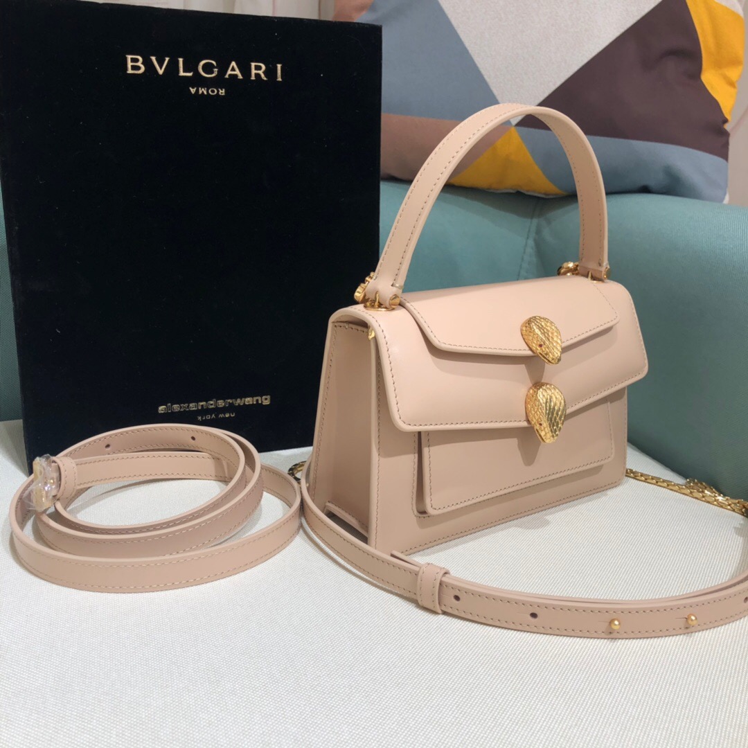 ALEXANDER WANG x BVULGARI Belt Bag - CRIS&COCO ALEXANDER WANG x BVLGARI Belt Bag. Original Quality Bag including gift box, care book, dust bag, authenticity card. The belt bag is a dream to style, as it features two detachable straps and a detachable handle and can be worn on the waist, as a crossbody bag, as a clutch or over the shoulder. BVLGARI and ALEXANDER WANG have reprised Serpenti Through The Eyes of ALEXANDER WANG for 2020, with the exciting addition of two brand new bags. While the two in-demand fashion houses may not reveal themselves to be the most obvious collaborators at a superficial glance, they have nonetheless merged to produce their latest capsule collection infusing allure with innovation. | Cris and Coco Authentic Quality designer bags and luxury accessories.
