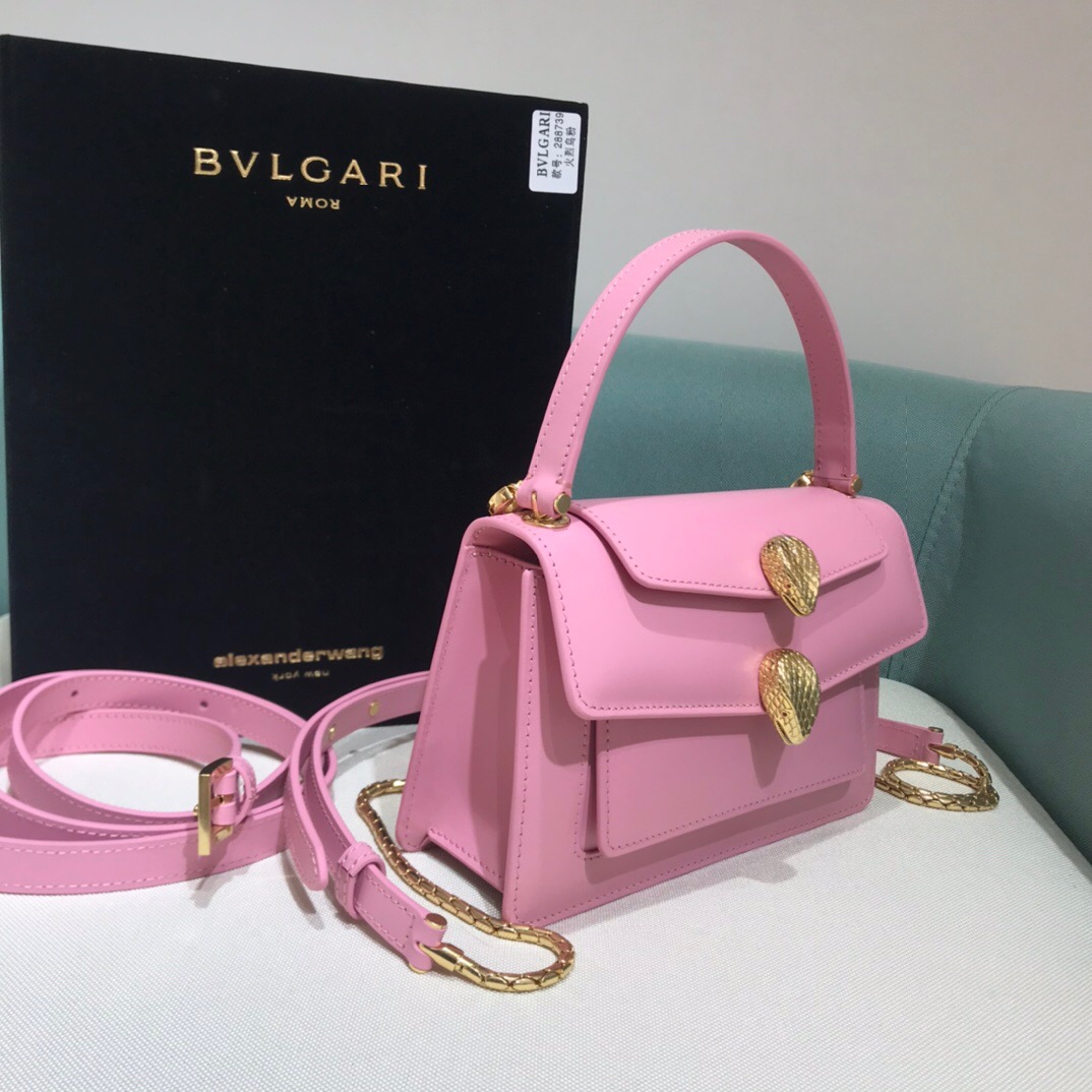 ALEXANDER WANG x BVULGARI Belt Bag - CRIS&COCO ALEXANDER WANG x BVLGARI Belt Bag. Original Quality Bag including gift box, care book, dust bag, authenticity card. The belt bag is a dream to style, as it features two detachable straps and a detachable handle and can be worn on the waist, as a crossbody bag, as a clutch or over the shoulder. BVLGARI and ALEXANDER WANG have reprised Serpenti Through The Eyes of ALEXANDER WANG for 2020, with the exciting addition of two brand new bags. While the two in-demand fashion houses may not reveal themselves to be the most obvious collaborators at a superficial glance, they have nonetheless merged to produce their latest capsule collection infusing allure with innovation. | Cris and Coco Authentic Quality designer bags and luxury accessories.