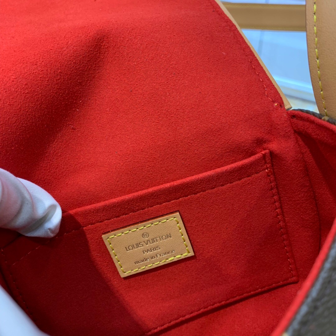 LOUIS VUITTON Tambourin Monogram Crossbody Bag. Original Quality Bag including gift box, care book, dust bag, authenticity card. Nicolas Ghesquière introduces a new version of the versatile and easy-to-wear LOUIS VUITTON Tambourin Monogram Crossbody Bag, made from Monogram canvas and natural cowhide leather. Small and lightweight with a practical inside pocket, this functional bag is ideal for everyday use. It can be worn over the shoulder or cross-body. | CRIS&COCO Authentic Quality Designer Bags and Luxury Accessories