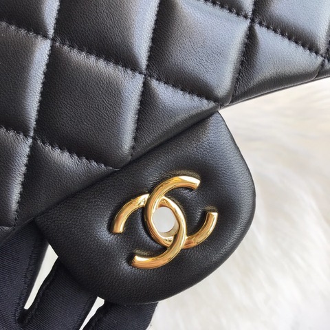 CHANEL Maxi Classic Handbag. Original Quality Bag including gift box, care book, dust bag, authenticity card. The Maxi Classic Double Flap bags are available in both grained calfskin and lambskin with silver/gold tone hardware. This classic handbag features a front flap with signature CC turn lock closure, half-moon back pocket. Also an adjustable interwoven silver/gold tone chain link and leather shoulder strap. | CRIS&COCO Authentic Quality Designer Bags and Luxury Accessories