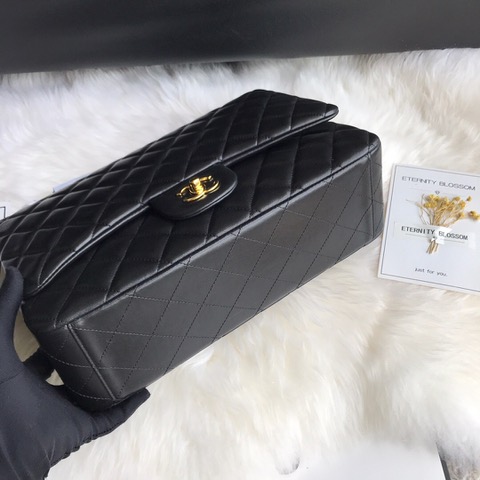 CHANEL Maxi Classic Handbag. Original Quality Bag including gift box, care book, dust bag, authenticity card. The Maxi Classic Double Flap bags are available in both grained calfskin and lambskin with silver/gold tone hardware. This classic handbag features a front flap with signature CC turn lock closure, half-moon back pocket. Also an adjustable interwoven silver/gold tone chain link and leather shoulder strap. | CRIS&COCO Authentic Quality Designer Bags and Luxury Accessories