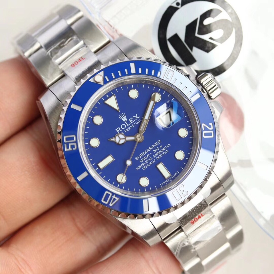ROLEX Submariner. Best quality watch including gift box, literature, dust bag, authenticity card. Rolex presents Oyster Perpetual Submariner watch that exemplify the historic links between Rolex and the world of diving. This timepiece is highlighted by the light reflections from the case sides and lugs – and fitted on a remodeled bracelet. Water-resistant. Japanese movement. | CRIS&COCO Authentic Quality Designer Bags and Luxury Accessories