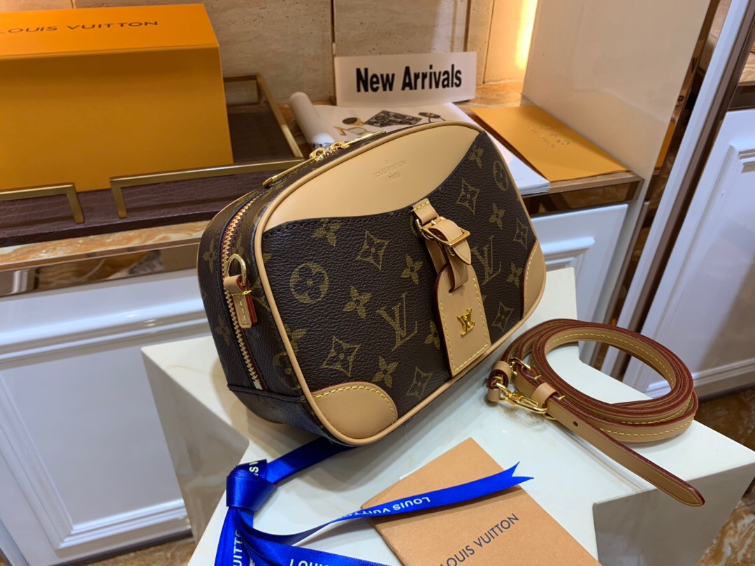 LOUIS VUITTON Deauville Mini Bag. Original Quality Bag including gift box, care book, dust bag, authenticity card. For Fall-Winter 2020, Nicolas Ghesquière introduces the Deauville Mini handbag. This adorable camera bag in Monogram canvas with natural leather trim will bring a touch of retro chic to any look. Compact and lightweight, it has an adjustable leather strap for shoulder and cross-body carry. | CRIS&COCO Authentic Quality Designer Bags and Luxury Accessories