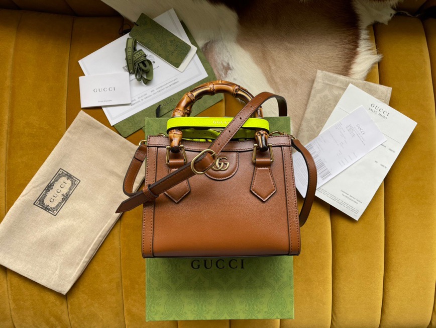 GUCCI Diana Mini Tote Bag. Original Quality Bag including gift box, care book, dust bag, authenticity card. Combining recognizable elements of the House, the mini tote bag is defined by its bamboo handles and Double G hardware. Crafted from leather, the accessory is further accentuated by two neon bands, a playful reference to the bands used to keep handles in shape. | CRIS&COCO Authentic Quality Designer Bags and Luxury Accessories
