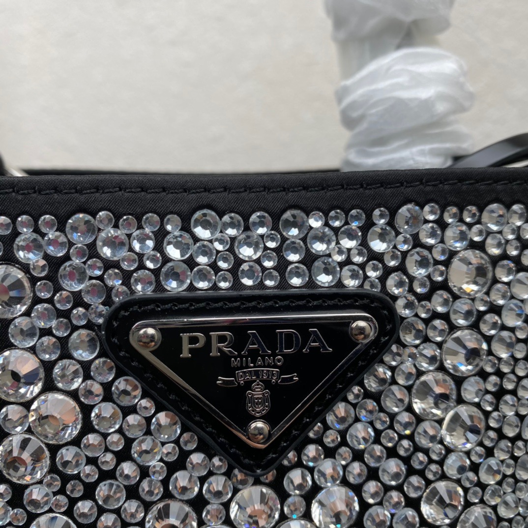 PRADA Panier Satin Bag With Crystals. Original Quality Bag including gift box, care book, dust bag, authenticity card. The elegant design of this Panier bag is emphasized by luminous all-over crystals that recall the jewelry world. The bag has a detachable shoulder strap and an exclusive name tag with metal logo. | CRIS&COCO Authentic Quality Designer Bags and Luxury Accessories