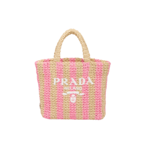 Small Crochet Tote Bag. Elevate Your Look with an Exquisite Tote Bag! This exquisite tote bag has a deconstructed design made of a light, natural material with a summery mood, raffia-effect yarn. Embroidered lettering logo decorates the front, and the emblematic triangle in enameled metal is the perfect finishing touch to the side. | CRIS&COCO Authentic Quality Designer Bags and Luxury Accessories
