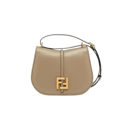 C’mon Medium. Timeless Elegance, Embodied in Leather. Elegantly designed, this medium-sized satchel bag boasts graceful, curved lines that exude femininity. Its elongated flap is adorned with a striking metal FF logo, adding a touch of sophistication to its overall charm. Crafted from supple leather with meticulously embossed edges and intricate details, this bag radiates a sense of refined luxury. The sides of the bag seamlessly blend with the overall design, crafted from the same tone-on-tone full-grain leather, ensuring a harmonious and visually pleasing aesthetic.