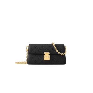 Wallet-On-Chain-Métis - CRIS&COCO Wallet On Chain Métis: Sophistication Meets Heritage. The Metis Wallet on Chain is a testament to craftsmanship, fashioned from exquisitely grained Monogram Empreinte leather, bearing Louis Vuitton's iconic Monogram pattern with precision. Its chic trapezoidal silhouette and front flap, fastened by an elegant S-lock clasp, pay homage to the heritage of Louis Vuitton's iconic trunks. With a removable chain that offers versatile cross-body wear, this bag seamlessly blends timeless style with modern functionality.