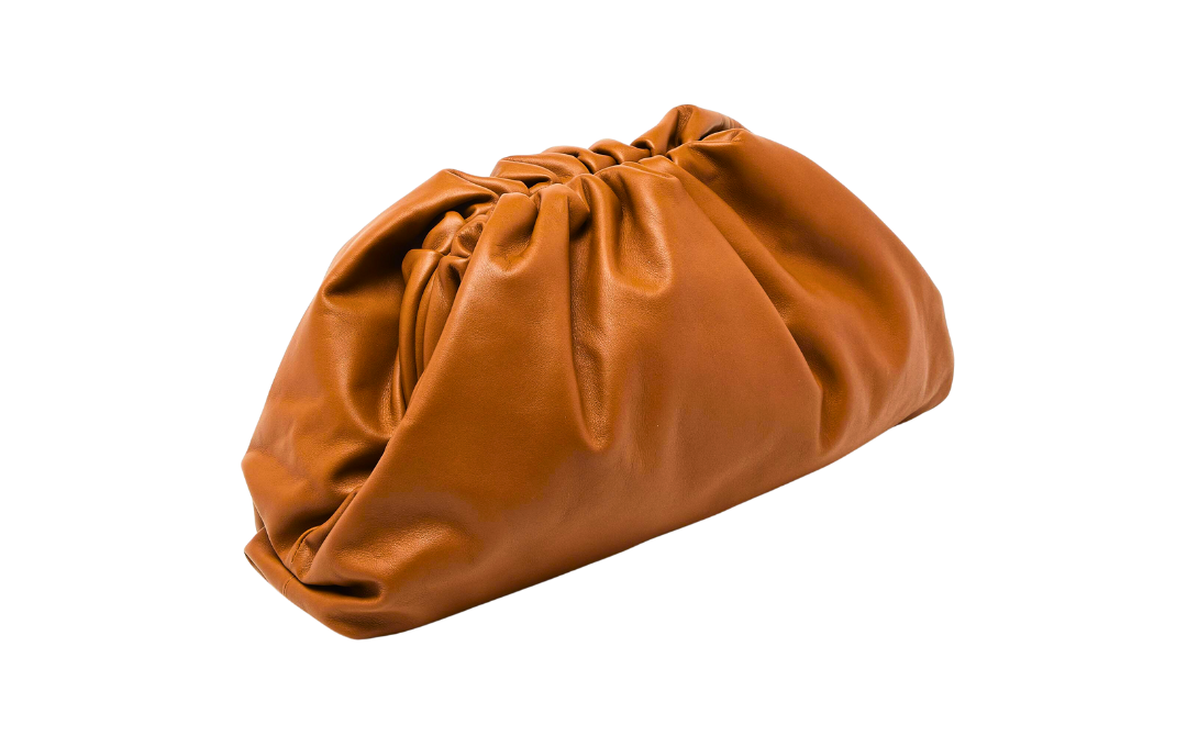 Clutch Bottega Veneta The Pouch clutch displayed against a clean white background, evoking the understated elegance perfect for an uptown cocktail party.