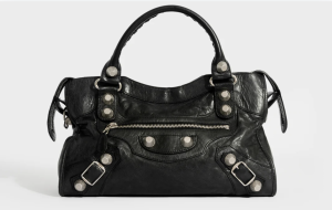 BALENCIAGA City Bag: The Ultimate Street Style Icon - CRIS&COCO A black BALENCIAGA City Bag with signature hardware and slouchy design.