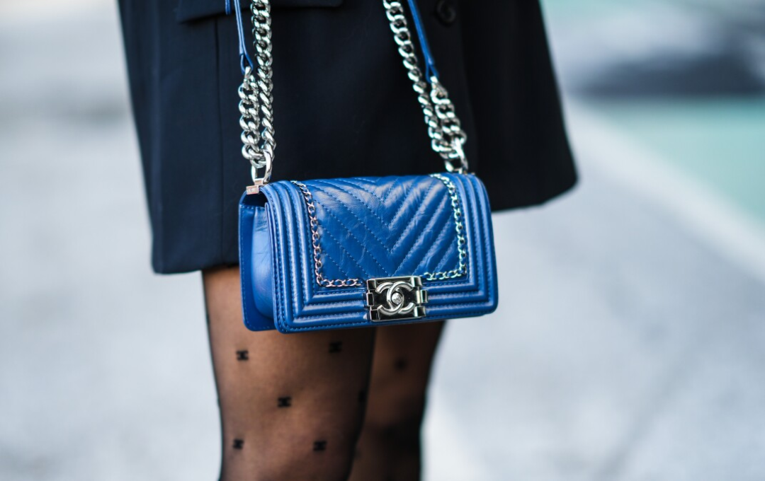 Modern Edge: The CHANEL Boy Bag in Royal Blue CHANEL Boy Bag in royal blue lambskin with silver chain