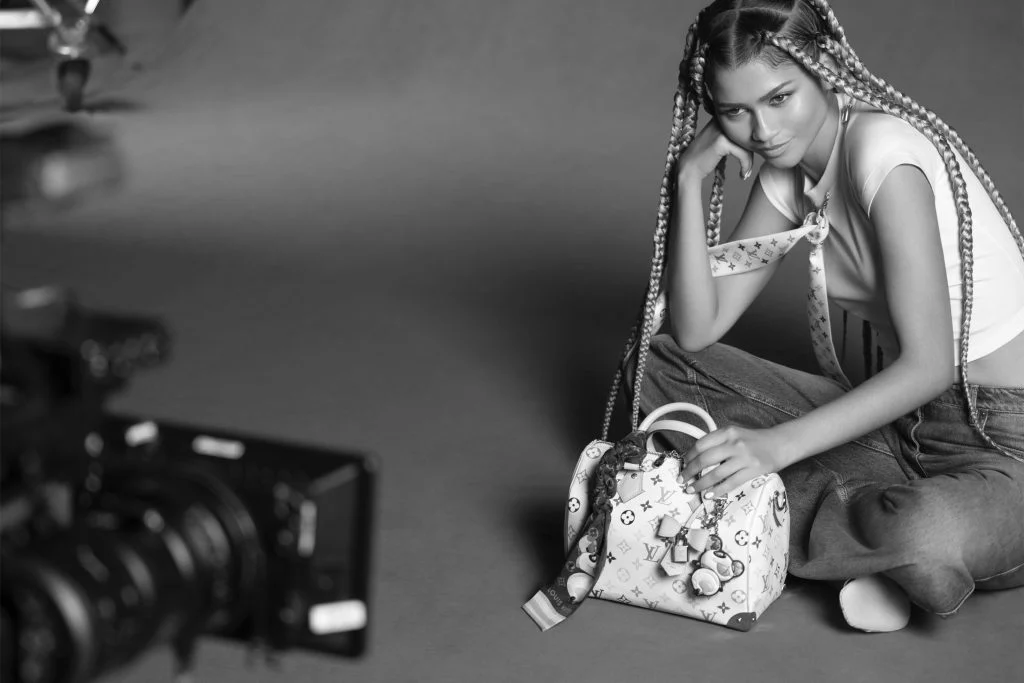 The Louis Vuitton Speedy: A Timeless Classic Louis Vuitton Speedy bag held by a celebrity