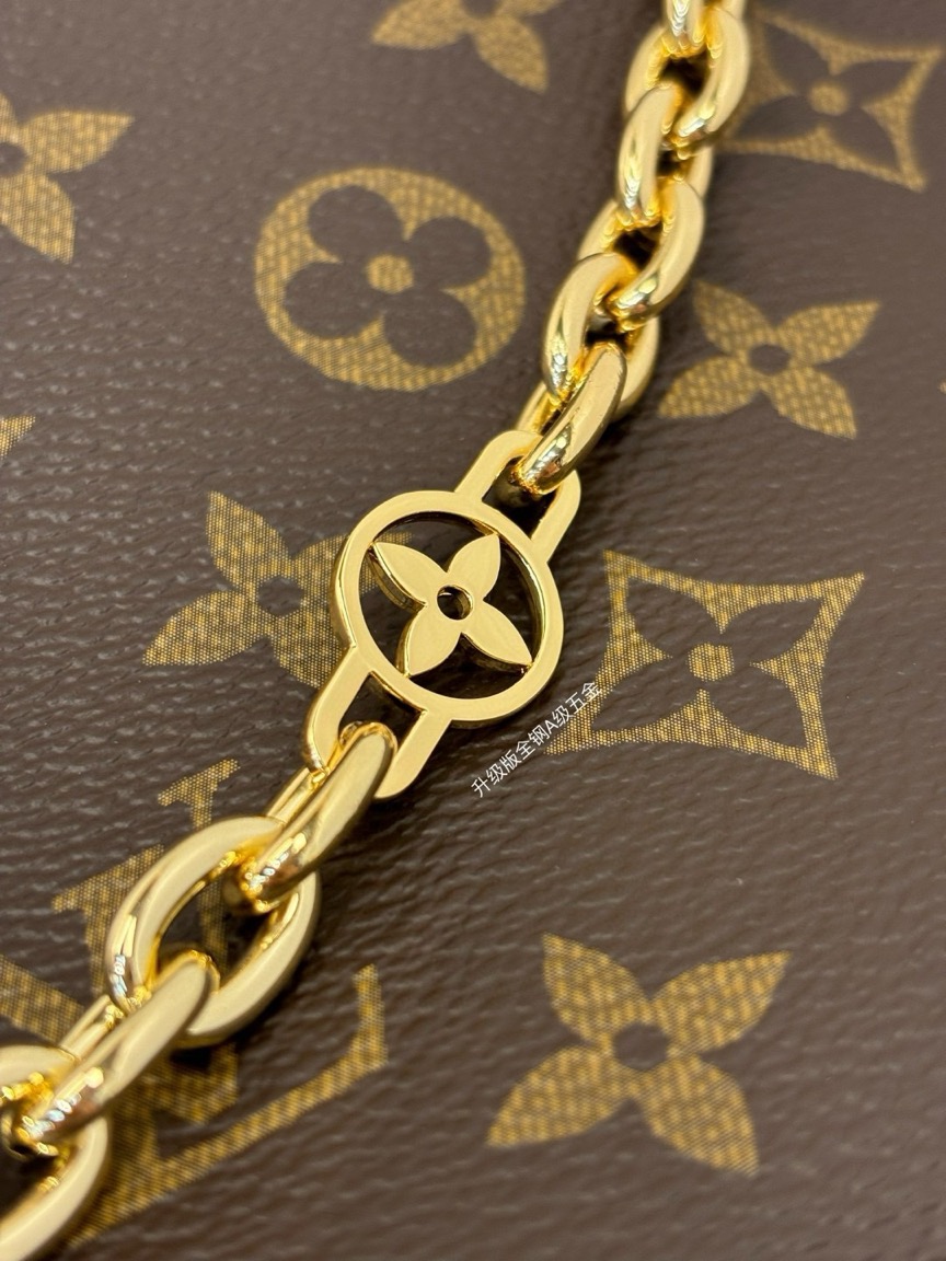 CarryAll BB. Authentic quality luxury bag crafted in genuine leather comes with authenticity card, dust bag and gift bag. Effortless Elegance, Day to Night – The CarryAll BB Reimagined. The iconic CarryAll BB returns this season with a stylish twist, perfect for transitioning from day to evening. Expertly crafted from the House’s signature Monogram canvas, it’s elevated with a gleaming gold-toned chain adorned with Monogram Flowers. Thoughtful details like the contrasting leather name tag and matching lace closure add a refined touch. Inside, a zipped pocket offers a convenient spot to keep your everyday essentials—like a credit card—close at hand.