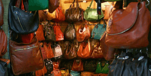 A craftsman working on leather goods in Shenzhen
