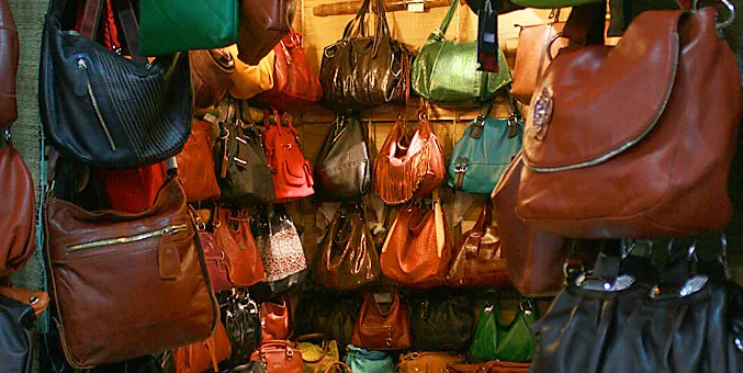 A craftsman working on leather goods in Shenzhen A craftsman working on leather goods in Shenzhen