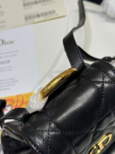 Small Caro Backpack. Authentic quality luxury bag crafted in genuine leather comes with authenticity card, dust bag and gift bag. Elegance Meets Effortless Edge. Elevate your everyday with the Small Caro Backpack — a flawless blend of modern femininity and iconic House craftsmanship. Luxuriously crafted in lambskin, its supple silhouette is enhanced by bold Macrocannage topstitching that whispers timeless *ior style. The antique gold-finish ‘CD’ clasp opens to a drawstring main compartment, perfectly balancing beauty and practicality. A discreet flap pocket keeps your daily essentials close at hand, while the top handle and adjustable leather straps offer versatile, all-day comfort. Whether slung over your shoulder or carried by hand, this petite powerhouse delivers Parisian polish in every step. - CRIS&COCO Small Caro Backpack. Authentic quality luxury bag crafted in genuine leather comes with authenticity card, dust bag and gift bag. Elegance Meets Effortless Edge. Elevate your everyday with the Small Caro Backpack — a flawless blend of modern femininity and iconic House craftsmanship. Luxuriously crafted in lambskin, its supple silhouette is enhanced by bold Macrocannage topstitching that whispers timeless *ior style. The antique gold-finish ‘CD’ clasp opens to a drawstring main compartment, perfectly balancing beauty and practicality. A discreet flap pocket keeps your daily essentials close at hand, while the top handle and adjustable leather straps offer versatile, all-day comfort. Whether slung over your shoulder or carried by hand, this petite powerhouse delivers Parisian polish in every step.