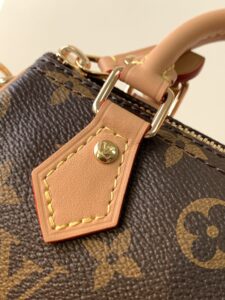 Speedy Nano. Authentic quality luxury bag crafted in genuine leather comes with authenticity card, dust bag and gift bag. Iconic Style, Perfectly Miniaturized. Meet the LV Speedy Nano — a petite powerhouse that captures the timeless allure of the iconic Speedy in its most charming form. Revamped in classic Monogram canvas and finished with aged natural cowhide leather, this mini marvel is made for the modern minimalist. Crafted with delicate gold-tone hardware and featuring two signature top handles, the Speedy Nano is both playful and practical. Its removable, adjustable shoulder strap adds effortless versatility—carry it by hand for polished poise or sling it crossbody for chic, on-the-go ease. Compact enough for your essentials. Iconic enough to turn heads. Small bag, big legacy! - CRIS&COCO Speedy Nano. Authentic quality luxury bag crafted in genuine leather comes with authenticity card, dust bag and gift bag. Iconic Style, Perfectly Miniaturized. Meet the LV Speedy Nano — a petite powerhouse that captures the timeless allure of the iconic Speedy in its most charming form. Revamped in classic Monogram canvas and finished with aged natural cowhide leather, this mini marvel is made for the modern minimalist. Crafted with delicate gold-tone hardware and featuring two signature top handles, the Speedy Nano is both playful and practical. Its removable, adjustable shoulder strap adds effortless versatility—carry it by hand for polished poise or sling it crossbody for chic, on-the-go ease. Compact enough for your essentials. Iconic enough to turn heads. Small bag, big legacy!