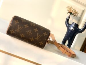 Speedy Nano. Authentic quality luxury bag crafted in genuine leather comes with authenticity card, dust bag and gift bag. Iconic Style, Perfectly Miniaturized. Meet the LV Speedy Nano — a petite powerhouse that captures the timeless allure of the iconic Speedy in its most charming form. Revamped in classic Monogram canvas and finished with aged natural cowhide leather, this mini marvel is made for the modern minimalist. Crafted with delicate gold-tone hardware and featuring two signature top handles, the Speedy Nano is both playful and practical. Its removable, adjustable shoulder strap adds effortless versatility—carry it by hand for polished poise or sling it crossbody for chic, on-the-go ease. Compact enough for your essentials. Iconic enough to turn heads. Small bag, big legacy!1 - CRIS&COCO Speedy Nano. Authentic quality luxury bag crafted in genuine leather comes with authenticity card, dust bag and gift bag. Iconic Style, Perfectly Miniaturized. Meet the LV Speedy Nano — a petite powerhouse that captures the timeless allure of the iconic Speedy in its most charming form. Revamped in classic Monogram canvas and finished with aged natural cowhide leather, this mini marvel is made for the modern minimalist. Crafted with delicate gold-tone hardware and featuring two signature top handles, the Speedy Nano is both playful and practical. Its removable, adjustable shoulder strap adds effortless versatility—carry it by hand for polished poise or sling it crossbody for chic, on-the-go ease. Compact enough for your essentials. Iconic enough to turn heads. Small bag, big legacy!