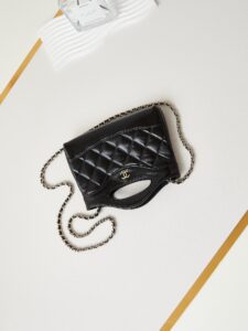 31 Nano Shopping Bag. Authentic quality luxury bag crafted in genuine leather comes with authenticity card, dust bag and gift bag. Small in size, grand in statement.  A miniature marvel that captures the sophistication of *ANEL in its most playful form. Crafted with meticulous precision, this petite icon merges the timeless spirit of the *ANEL 31 with a modern twist on everyday elegance. Designed in supple lambskin and finished with gleaming gold-tone hardware, the Nano 31 doesn’t just carry your essentials — it carries your attitude. Whether worn crossbody, by hand, or dangling from the crook of your arm, this charming piece elevates every ensemble with a whisper of Parisian chic. Perfect for a night out or a day in the spotlight, it’s not just a bag — it’s your boldest accessory in its most compact form. Because luxury doesn't need to shout. Sometimes, it just needs to charm.