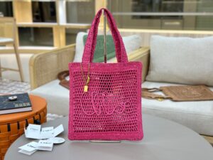 Summer Banana Tote Bag. Authentic quality luxury bag crafted in genuine leather comes with authenticity card, dust bag and gift bag. Heritage in Hand: Where Artisan Craft Meets Summer Elegance. Introducing the Summer Banana Tote—an artisanal masterpiece crafted from raffia and calfskin by a single artisan over 4.5 days in partnership with Made For A Woman. This spacious tote is adorned with a handwritten signature inspired by *loé’s rich heritage, while a playful dangling chain and delicate charms add the perfect finishing touch. A celebration of craftsmanship and effortless summer style. - CRIS&COCO Summer Banana Tote Bag. Authentic quality luxury bag crafted in genuine leather comes with authenticity card, dust bag and gift bag. Heritage in Hand: Where Artisan Craft Meets Summer Elegance. Introducing the Summer Banana Tote—an artisanal masterpiece crafted from raffia and calfskin by a single artisan over 4.5 days in partnership with Made For A Woman. This spacious tote is adorned with a handwritten signature inspired by *loé’s rich heritage, while a playful dangling chain and delicate charms add the perfect finishing touch. A celebration of craftsmanship and effortless summer style.