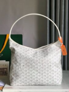 Bohème Hobo Bag. Authentic quality luxury bag crafted in genuine leather comes with authenticity card, dust bag and gift bag. Wander Freely. Carry Elegantly. Introducing the Goyard Bohème Hobo Bag—a tribute to Parisian spirit and wanderlust. Inspired by the timber raftsmen’s humble travel pouches, this bag blends heritage storytelling with everyday luxury. Crafted to be exceptionally lightweight and flexible, it drapes effortlessly on your shoulder with a wide, comfortable handle designed for long city strolls or spontaneous weekend escapes. Its beauty lies not only in its sleek silhouette but also in its thoughtful functionality. The secure zip closure keeps your essentials safe, while the removable snap-fastened pouch doubles as a chic clutch or wallet—perfect for a quick dash or stylish switch-up. Whether you’re wandering through cobblestone streets or navigating your daily routine, the Bohème ensures your essentials are always within reach. This is not just a bag—it’s your elegant partner in carefree adventures.