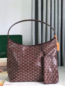 Bohème Hobo Bag. Authentic quality luxury bag crafted in genuine leather comes with authenticity card, dust bag and gift bag. Wander Freely. Carry Elegantly. Introducing the Goyard Bohème Hobo Bag—a tribute to Parisian spirit and wanderlust. Inspired by the timber raftsmen’s humble travel pouches, this bag blends heritage storytelling with everyday luxury. Crafted to be exceptionally lightweight and flexible, it drapes effortlessly on your shoulder with a wide, comfortable handle designed for long city strolls or spontaneous weekend escapes. Its beauty lies not only in its sleek silhouette but also in its thoughtful functionality. The secure zip closure keeps your essentials safe, while the removable snap-fastened pouch doubles as a chic clutch or wallet—perfect for a quick dash or stylish switch-up. Whether you’re wandering through cobblestone streets or navigating your daily routine, the Bohème ensures your essentials are always within reach. This is not just a bag—it’s your elegant partner in carefree adventures.