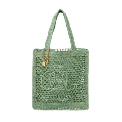 Summer Banana Tote Bag. Authentic quality luxury bag crafted in genuine leather comes with authenticity card, dust bag and gift bag. Heritage in Hand: Where Artisan Craft Meets Summer Elegance. Introducing the Summer Banana Tote—an artisanal masterpiece crafted from raffia and calfskin by a single artisan over 4.5 days in partnership with Made For A Woman. This spacious tote is adorned with a handwritten signature inspired by *loé’s rich heritage, while a playful dangling chain and delicate charms add the perfect finishing touch. A celebration of craftsmanship and effortless summer style.