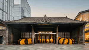 Side-by-side view of a LOUIS VUITTON flagship boutique and an online listing on Walmart.com