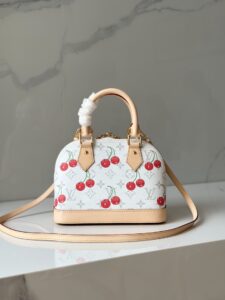 LV x TM Alma BB. Authentic quality luxury bag crafted in genuine leather comes with authenticity card, dust bag and gift bag. A Joyful Icon Reimagined. Playful, artistic, and instantly iconic—the Alma BB returns in a joyful re-edition as part of the celebrated LV x TM collection. This petite masterpiece blends the timeless Art Deco-inspired silhouette with Takashi Murakami’s signature whimsy, splashing the House’s Monogram canvas with bold, cherry-bright motifs. Crafted with natural leather accents and finished with polished gold-tone hardware, it features structured Toron top handles and a charming bow-shaped keybell that adds just the right amount of flirt. Compact yet attention-commanding, the Alma BB is a true collectible—full of joy, color, and unmistakable LV heritage. Carry art. Wear happiness. Make a statement. - CRIS&COCO LV x TM Alma BB. Authentic quality luxury bag crafted in genuine leather comes with authenticity card, dust bag and gift bag. A Joyful Icon Reimagined. Playful, artistic, and instantly iconic—the Alma BB returns in a joyful re-edition as part of the celebrated LV x TM collection. This petite masterpiece blends the timeless Art Deco-inspired silhouette with Takashi Murakami’s signature whimsy, splashing the House’s Monogram canvas with bold, cherry-bright motifs. Crafted with natural leather accents and finished with polished gold-tone hardware, it features structured Toron top handles and a charming bow-shaped keybell that adds just the right amount of flirt. Compact yet attention-commanding, the Alma BB is a true collectible—full of joy, color, and unmistakable LV heritage. Carry art. Wear happiness. Make a statement.