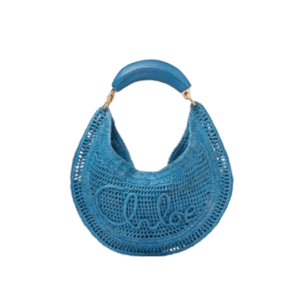 Summer Banana Hobo. Authentic quality luxury bag crafted in genuine leather comes with authenticity card, dust bag and gift bag. Artisanal Spirit, Curved in Style. Say hello to sunshine in bag form. The *LOÉ Summer Banana Hobo Bag is a joyful blend of craftsmanship and creativity, handwoven over four days by a single artisan in collaboration with Made For A Woman. This is not just a bag—it’s a story stitched in raffia and trimmed in luxurious calfskin. Its curved, banana-inspired silhouette hugs the shoulder with ease, while the sculptural handle and handwritten signature nod to *loé’s heritage of effortless elegance. Light, natural, and undeniably chic, it's the perfect companion for sun-soaked escapes or city strolls with a coastal state of mind. A celebration of craftsmanship, femininity, and the art of slow fashion.