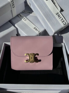 Small Flap Wallet Triomphe. Authentic quality luxury bag crafted in genuine leather comes with authenticity card, dust bag and gift bag. Small in Size, Grand in Style. Discover timeless sophistication in the palm of your hand with the *ELINE Small Flap Wallet TRIOMPHE in shiny calfskin. Meticulously crafted from luxurious leather, this compact beauty showcases the iconic Triomphe clasp in gold-tone metal, a refined nod to Parisian heritage. Despite its petite size, it opens to reveal smart compartments for cards, bills, and coins—proving that style never compromises function. Whether tucked into your favorite designer bag or carried solo for a night out, this wallet is your everyday dose of quiet luxury. - CRIS&COCO Small Flap Wallet Triomphe. Authentic quality luxury bag crafted in genuine leather comes with authenticity card, dust bag and gift bag. Small in Size, Grand in Style. Discover timeless sophistication in the palm of your hand with the *ELINE Small Flap Wallet TRIOMPHE in shiny calfskin. Meticulously crafted from luxurious leather, this compact beauty showcases the iconic Triomphe clasp in gold-tone metal, a refined nod to Parisian heritage. Despite its petite size, it opens to reveal smart compartments for cards, bills, and coins—proving that style never compromises function. Whether tucked into your favorite designer bag or carried solo for a night out, this wallet is your everyday dose of quiet luxury.