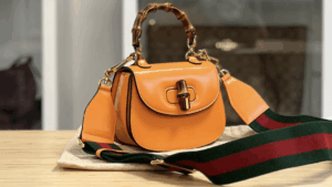 Small but mighty—this bamboo beauty carries more attitude than your oversized tote ever could.