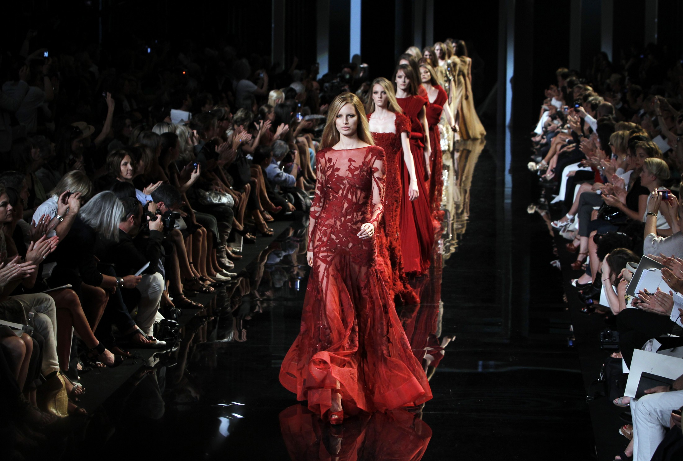 Luxury on the runway, stitched in silence. The true cost walks behind the curtain.  Luxury on the runway, stitched in silence. The true cost walks behind the curtain.