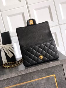 Mini Handy CC Flap Bag. Authentic quality luxury bag crafted in genuine leather comes with authenticity card, dust bag and gift bag. Petite yet powerful, the Caviar Quilted Mini Handy CC Flap embodies timeless sophistication. Crafted from signature caviar leather with classic diamond quilting, this bag exudes refined elegance in every stitch. The design features a structured top handle and a leather-threaded chain strap, offering versatile styling from hand-carry to crossbody. Gold-plated CC details and the signature turn-lock closure add the perfect touch of luxury. Inside, a sleek leather interior with both zipper and patch pockets ensures your essentials stay beautifully organized. Compact, iconic, and unmistakably *ANEL — this is the ultimate statement in modern classic style. - CRIS&COCO Mini Handy CC Flap Bag. Authentic quality luxury bag crafted in genuine leather comes with authenticity card, dust bag and gift bag. Petite yet powerful, the Caviar Quilted Mini Handy CC Flap embodies timeless sophistication. Crafted from signature caviar leather with classic diamond quilting, this bag exudes refined elegance in every stitch. The design features a structured top handle and a leather-threaded chain strap, offering versatile styling from hand-carry to crossbody. Gold-plated CC details and the signature turn-lock closure add the perfect touch of luxury. Inside, a sleek leather interior with both zipper and patch pockets ensures your essentials stay beautifully organized. Compact, iconic, and unmistakably *ANEL — this is the ultimate statement in modern classic style.