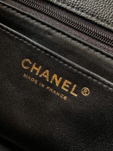 Mini Handy CC Flap Bag. Authentic quality luxury bag crafted in genuine leather comes with authenticity card, dust bag and gift bag. Petite yet powerful, the Caviar Quilted Mini Handy CC Flap embodies timeless sophistication. Crafted from signature caviar leather with classic diamond quilting, this bag exudes refined elegance in every stitch. The design features a structured top handle and a leather-threaded chain strap, offering versatile styling from hand-carry to crossbody. Gold-plated CC details and the signature turn-lock closure add the perfect touch of luxury. Inside, a sleek leather interior with both zipper and patch pockets ensures your essentials stay beautifully organized. Compact, iconic, and unmistakably *ANEL — this is the ultimate statement in modern classic style.